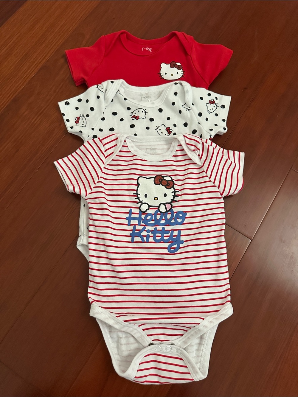 Hello Kitty Red, White and Black Baby Bodysuit Trio